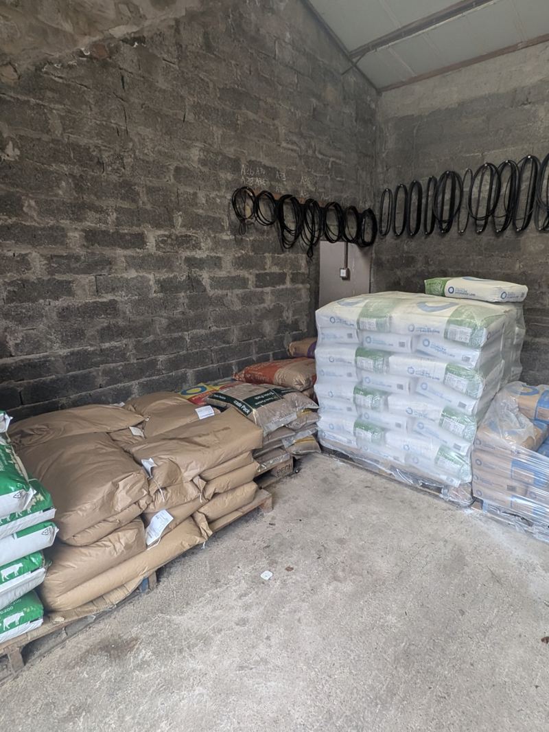 Pallets of bagged animal feed in the store at Langwathby